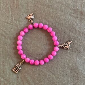 Unicorn and castle handcrafted stretch bracelet